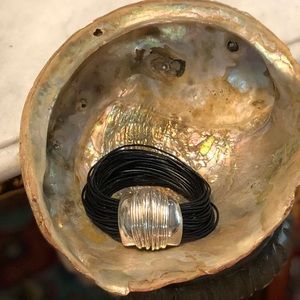 Black leather bracelet with silver accent